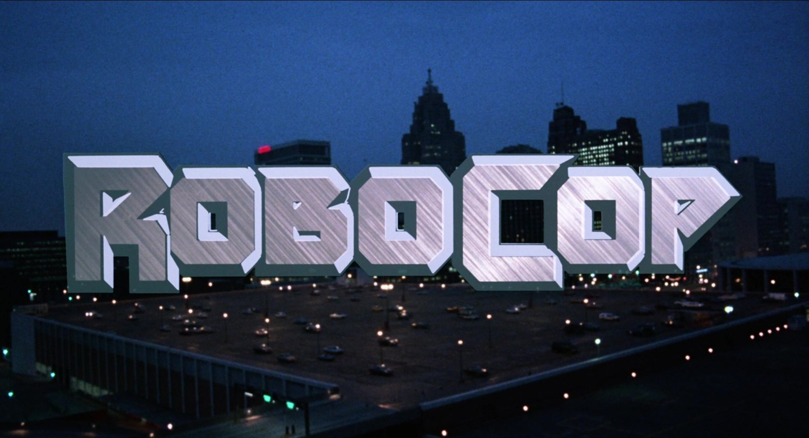 Le titre RoboCop sur la skyline de nuit