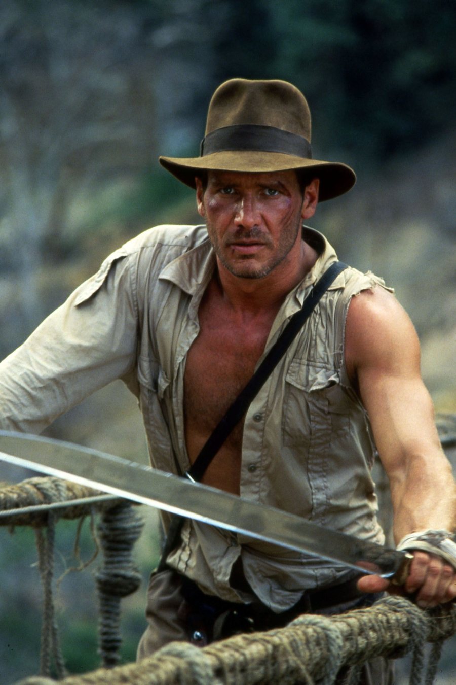 Harrison Ford, machette à la main, sur le pont suspendu — Indiana Jones et le Temple maudit, 1984
